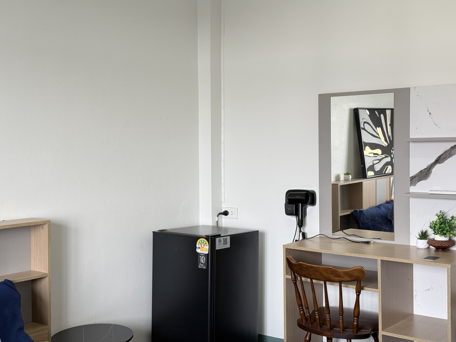Single Room refrigerator and vanity close view